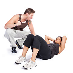 Image showing Exercise woman with trainer
