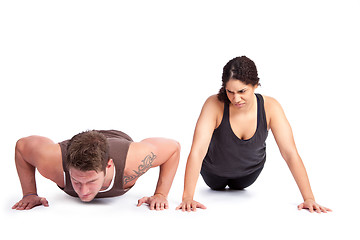 Image showing Exercise woman with trainer