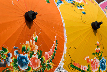 Image showing Painted cotton umbrellas