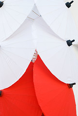 Image showing Red and white traditional umbrellas in Thailand