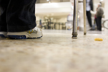 Image showing Floor view on a kid waiting at the airport