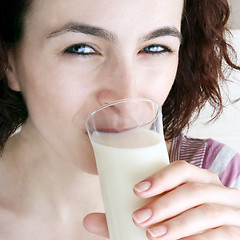 Image showing Young people eating milk with cereals