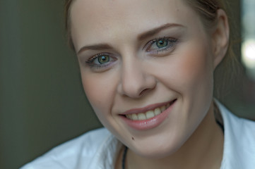 Image showing Woman applying makeup