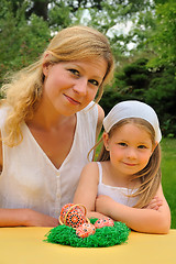 Image showing Young mother and daughter having Easter time