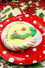 Image showing Christmas sucker on red plate