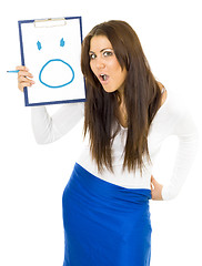 Image showing Shocked open-mouthed woman drawing smile