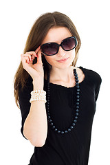 Image showing Woman in black dress and sunglasses