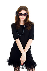 Image showing Woman in black dress and sunglasses