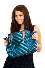 Image showing Young woman with her big purse