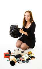 Image showing contents of womans hand bag