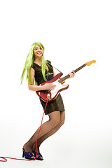 Image showing Guitarist with green hair