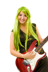 Image showing Woman with green hair and guitar