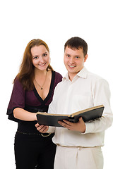 Image showing Couple with book  album