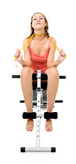 Image showing  woman sitting on bench for fitness