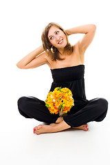 Image showing Woman with flowers resting