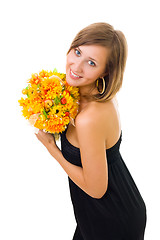 Image showing Woman and autumn flowers