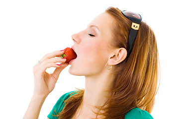 Image showing woman eating tasty strawberries