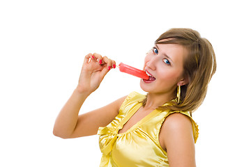 Image showing Woman in yellow with red ice cream