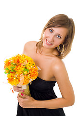Image showing woman with autumn flowers