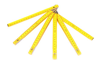 Image showing Yellow wooden ruler.