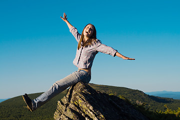 Image showing Woman on top of the wold