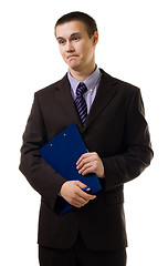 Image showing Confused young business man stand in formal suit