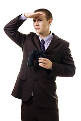 Image showing Business man looking for new opportunity