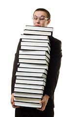 Image showing Man with a huge pile of books