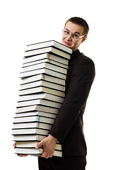 Image showing Man hold huge ammount of books expressing negativity 