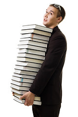 Image showing Student with many books tired