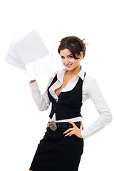 Image showing Business woman standing with pile of papers