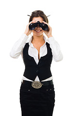 Image showing Woman looking into binocular