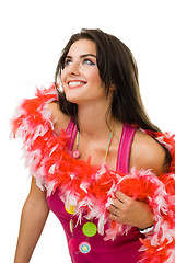 Image showing Young woman sitting with red feather