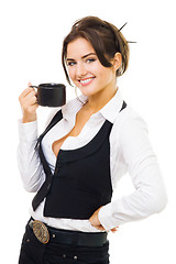 Image showing Woman standing with cup of coffee, smile and look at camera