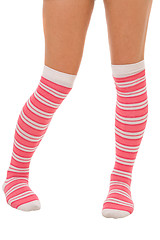 Image showing woman legs in color pink socks isolated 