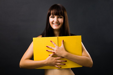 Image showing Sexy young woman with yellow