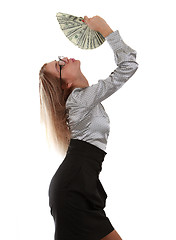 Image showing Girl with a fan of dollar bills