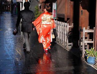 Image showing Japanese couple walking