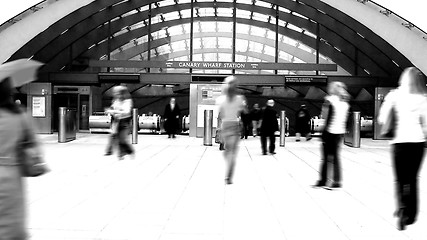 Image showing People walking to the tube station, London