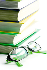 Image showing stack of books and glasses