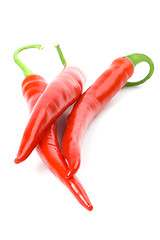 Image showing three red chilly peppers