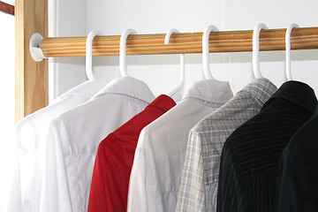 Image showing Shirts in closet
