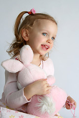 Image showing Baby girl and pink bunny