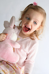 Image showing Baby girl and pink bunny