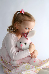 Image showing Baby girl and pink bunny