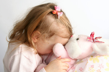 Image showing Baby girl and pink bunny