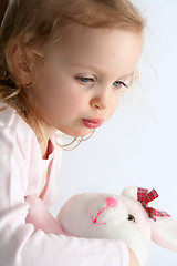 Image showing Baby girl and pink bunny