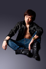 Image showing Handsome Asian man with leather jacket