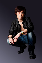 Image showing Handsome Asian man with leather jacket