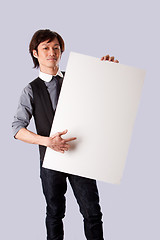 Image showing Asian business man pointing at white board